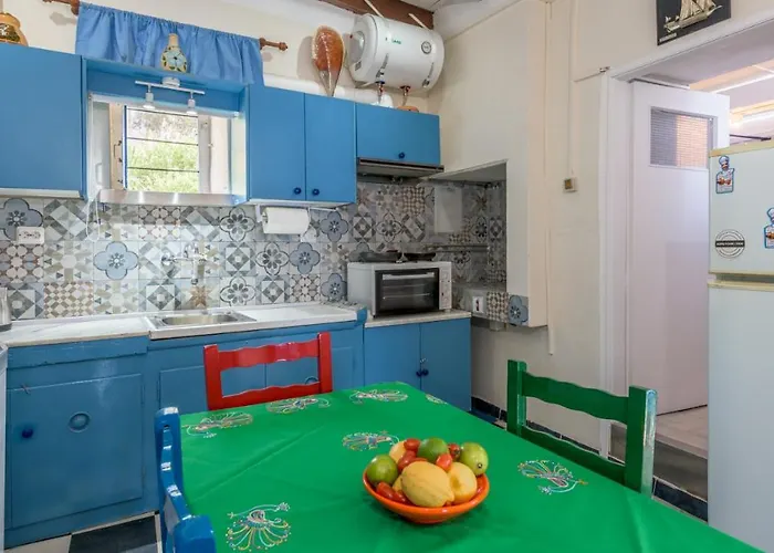 Blue Traditional Boathouse In Klima (Milos)